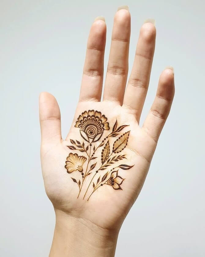 Unique negative space palm mehndi design with intricate patterns and empty spaces for a modern look.