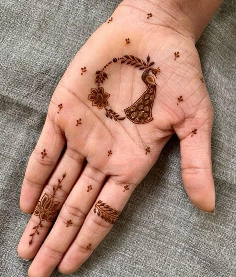 Simple and elegant minimalist palm mehndi design with clean lines and subtle details.